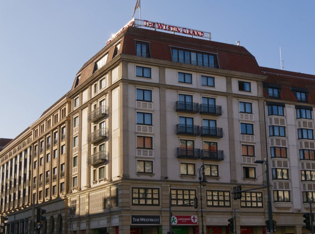 Crafting Captivating Headlines: Your awesome post title goes here The Westin Grand Hotel facade with a modern architectural design under daylight.